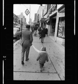 Kid Led By Scarf Used As Leash, Christmas Shopping