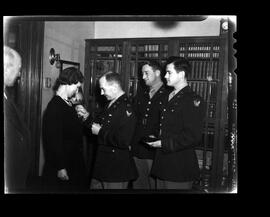 Howard, Mrs. J. (receiving medal)