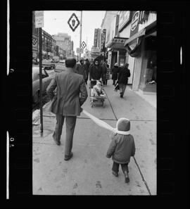 Kid Led By Scarf Used As Leash, Christmas Shopping